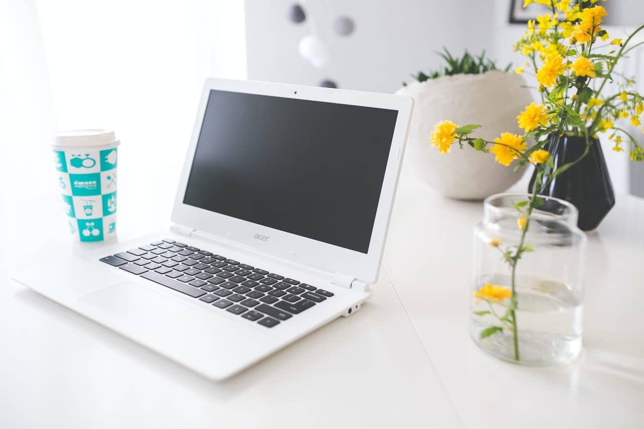 laptop on desk in bright room for online learning tip 6